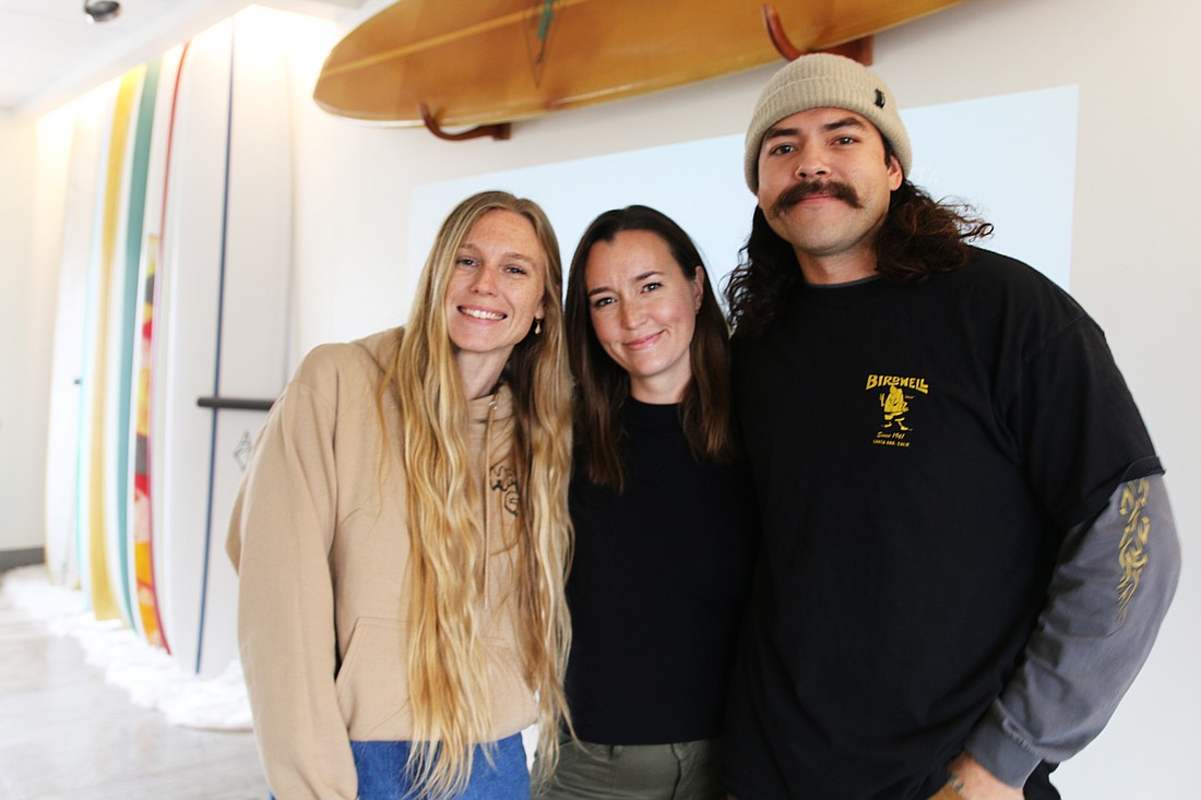 Happy Co. Surf and Coffee General Manager Kate Curtis and business owners Kila and Cory Smith. Photo by Jarleene Almenas