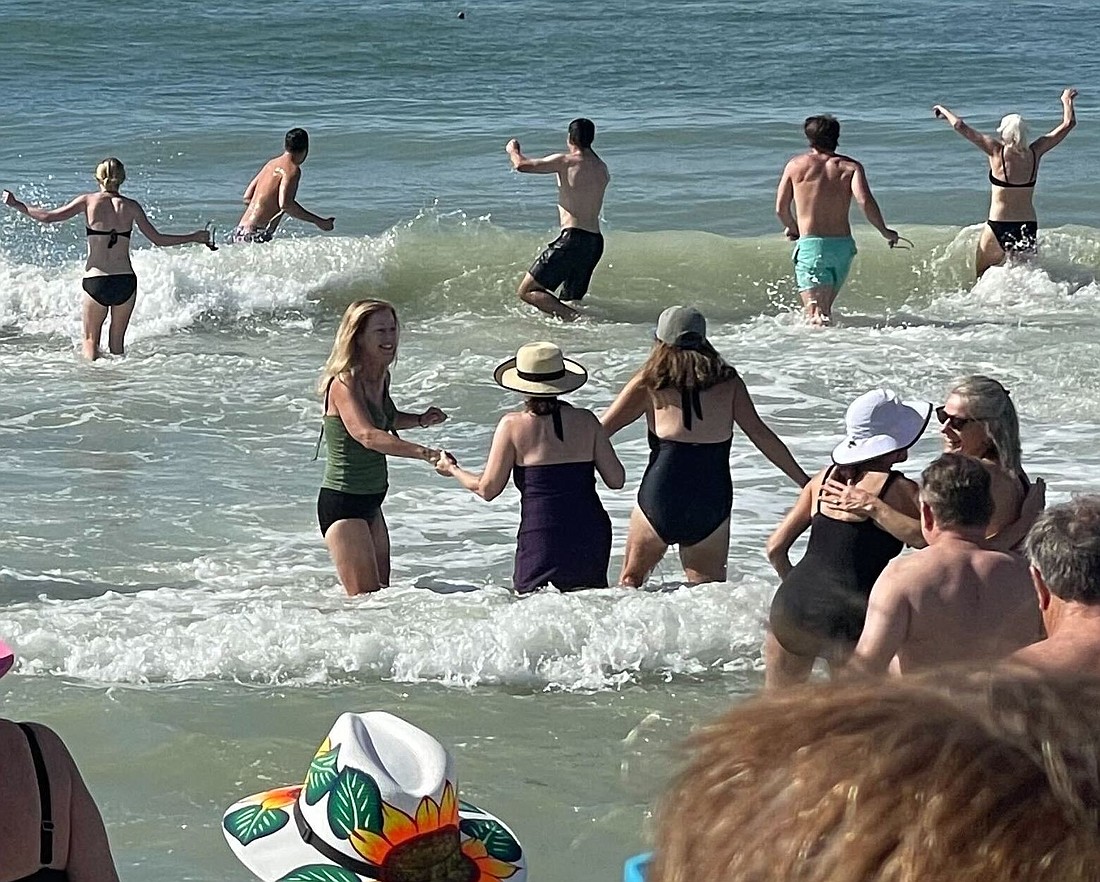 On Jan. 1 residents of Seaplace Condominiums take part in the annual Polar Plunge.