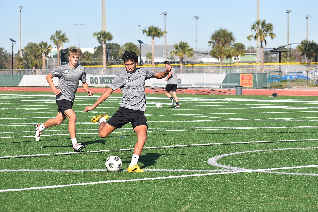 Lakewood Ranch junior midfielders Paolo Morales (front) and Ryan Johnson have been essential in helping transform the Mustangs' offensive strategy this season.