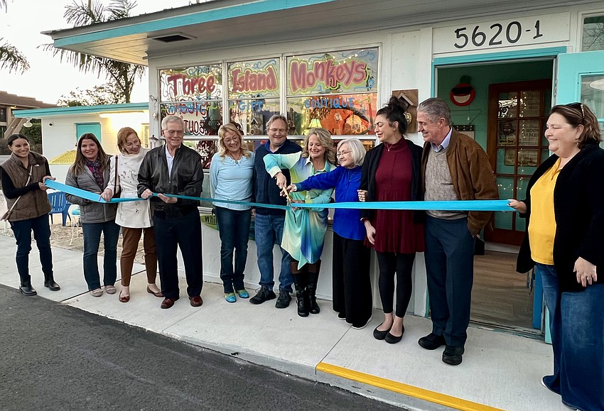 Brigette Kubin cut the ribbon for her business, Three Island Monkeys, on Jan. 8.