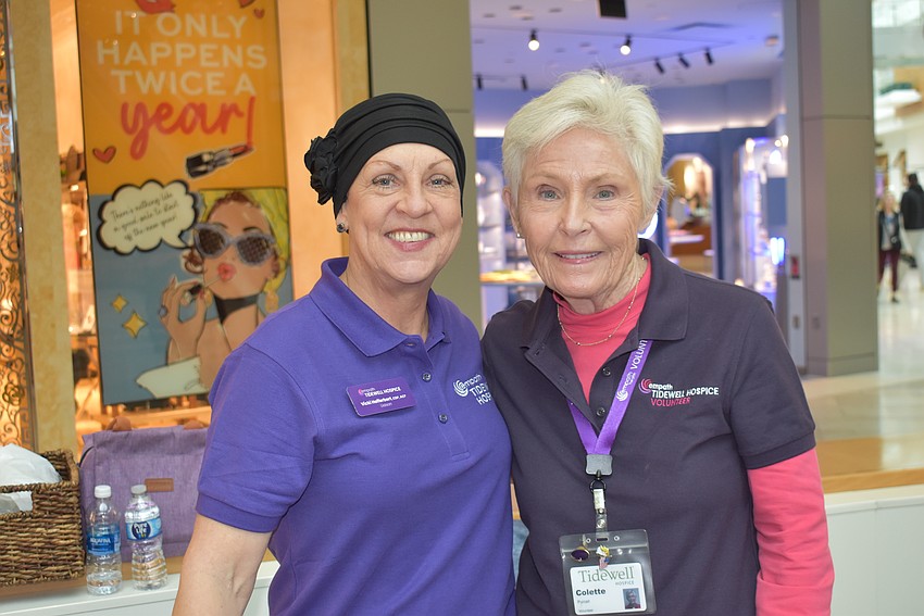 Liaison Vicki Hofferbert and volunteer Colette Purcell man the Tidewell Hospice table.
