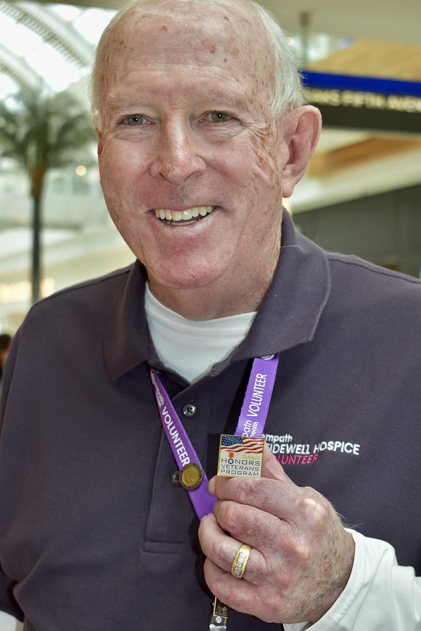 Volunteer Terry Purcell shows off his 