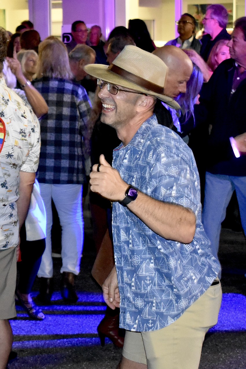 Dan Amato dances to the live music.