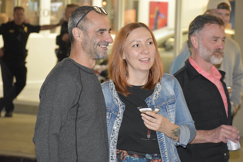 Otto Katona and Boglarka Veres watch the live music.