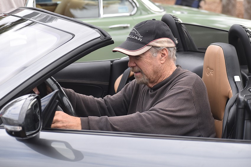 Bill Kazanecki of Dunedin starts up his car.