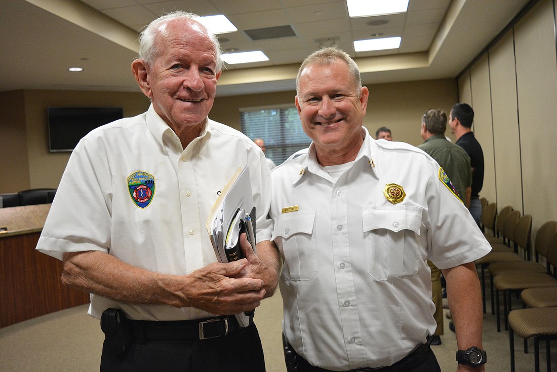 Don O'Leary and East Manatee Fire Rescue Chief Lee Whitehurst celebrate O'Leary's 2019 retirement as fire commissioner.