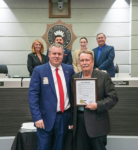 Front row: Ormond Beach Mayor Jason Leslie and airport Air Traffic Manager Steve Brockett. Back row: City Commissioners Lori Tolland, Travis Sargent, Kristin Deaton and Harold Briley. Photo courtesy of the city of Ormond Beach/Facebook