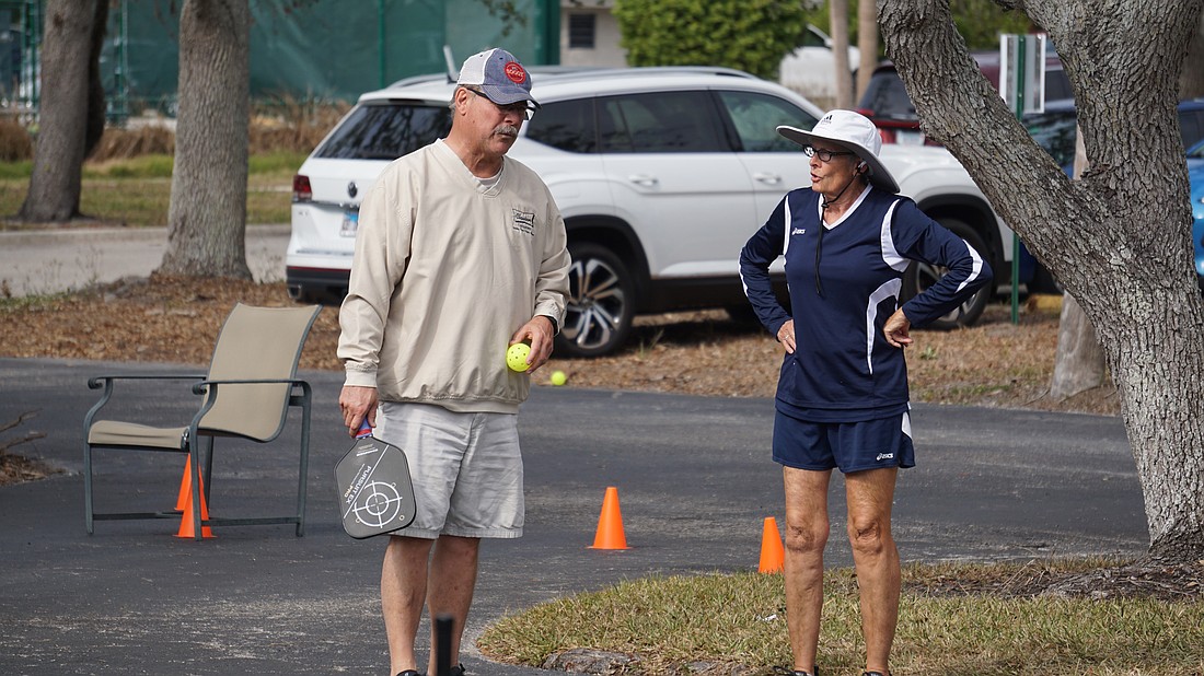 Instructor Terri Noyes talks with Pete Clausen about the basics of scoring in pickleball.