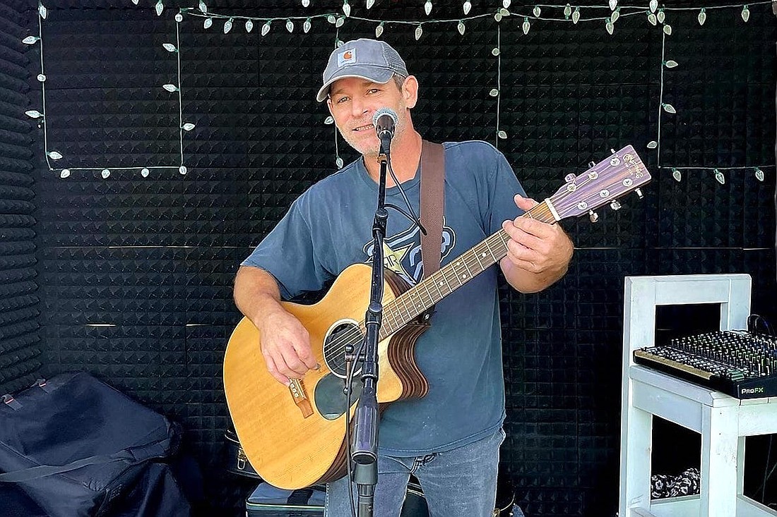 A musician performs on Cajun Beach's outdoor stage when the restaurant had an entertainment permit. Courtesy photo