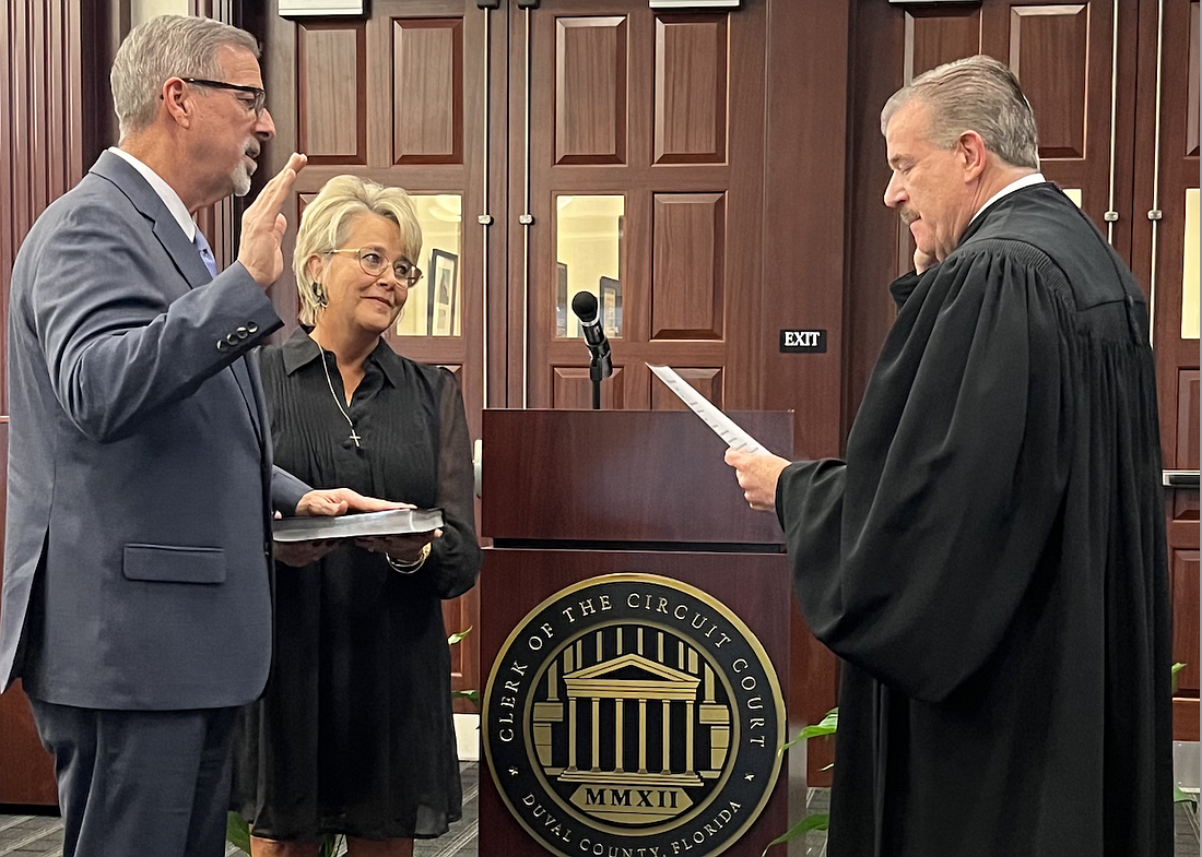 From left, Duval County Clerks of Courts Jody Phillips, his wife, Susan Phillips, and 4th Circuit Chief Judge Lance Day.