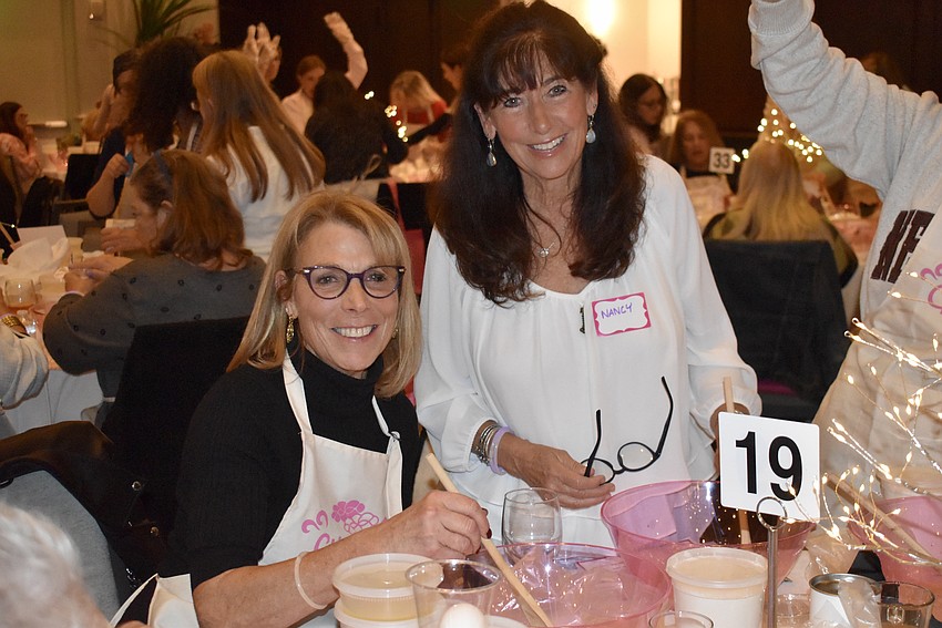 Esplanade residents Gale Berman and Nancy Silver attend the annual Mega Challah Bake for the first time.