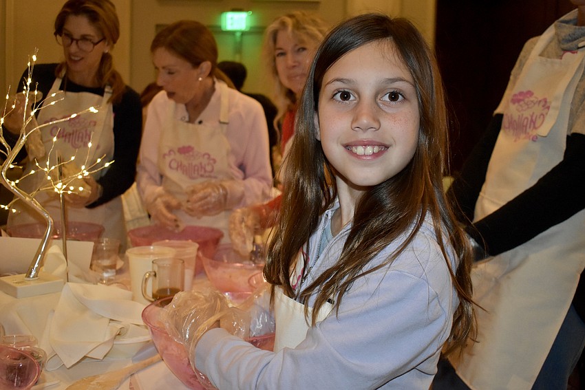 At 9 years old, Ella Ben-Ami is the youngest baker in the crowd. She also volunteered to help set up with her mom Celeste.