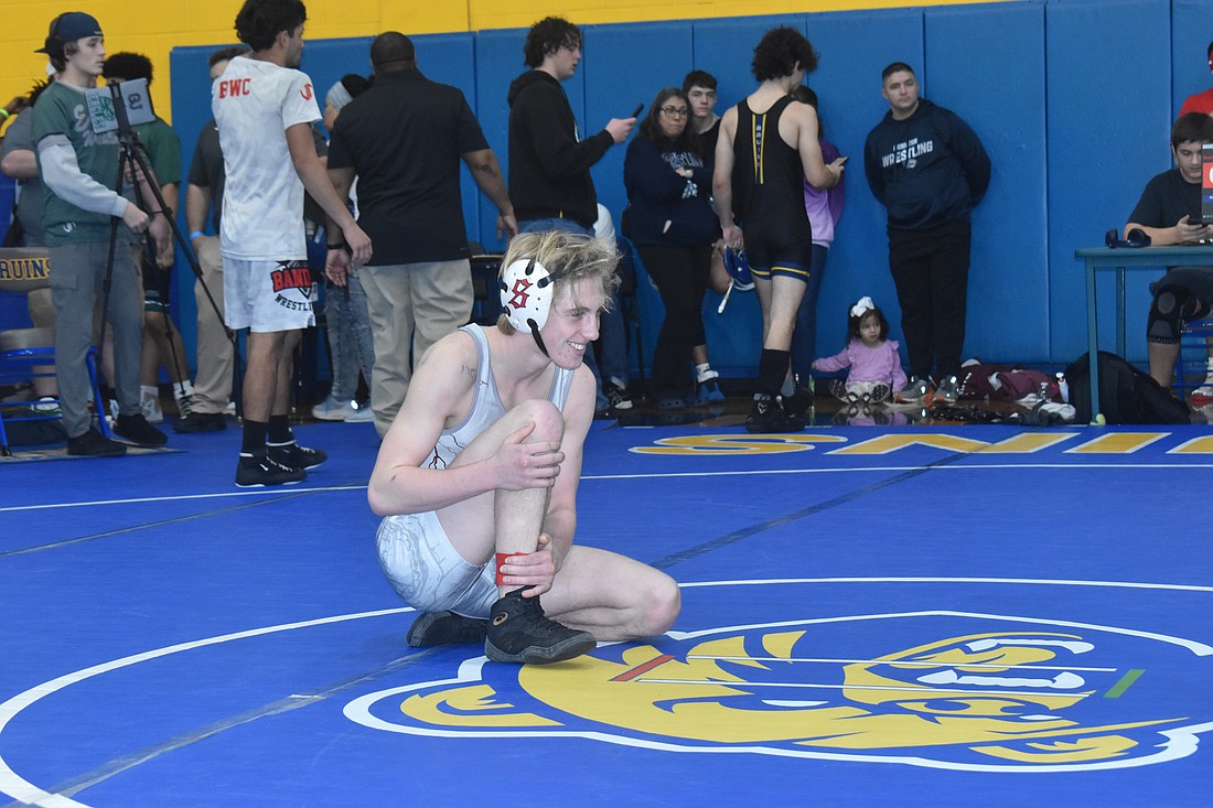 Braden River senior Matthew Ireland is all smiles before his match against George Jenkins High's Everett Smith Jan. 18. Ireland won the match by pin and went on to win the 122-pound title of the Ricky Gullet Invitational at Bayshore High.