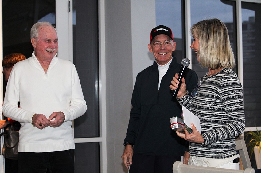 Rich McGrath and Matt Walsh thank Kay Thayer for coordinating the Observer Challenge tennis tournament for the past 25 years.