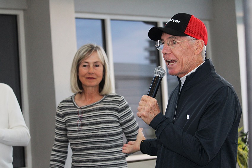 Matt Walsh commends Kay Thayer for her work coordinating the Observer Challenge tennis tournament for 25 years.