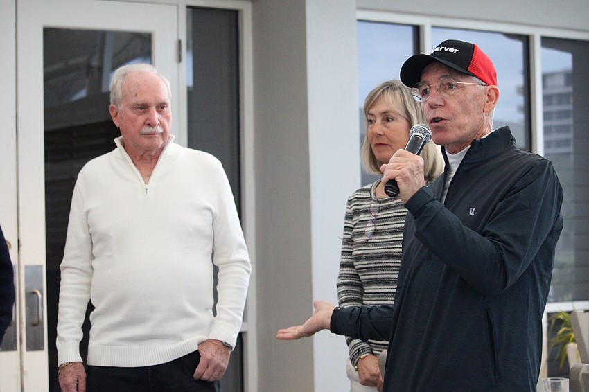 Matt Walsh and Rich McGrath thank Kay Thayer for coordinating the Observer Challenge tennis tournament for the past 25 years.