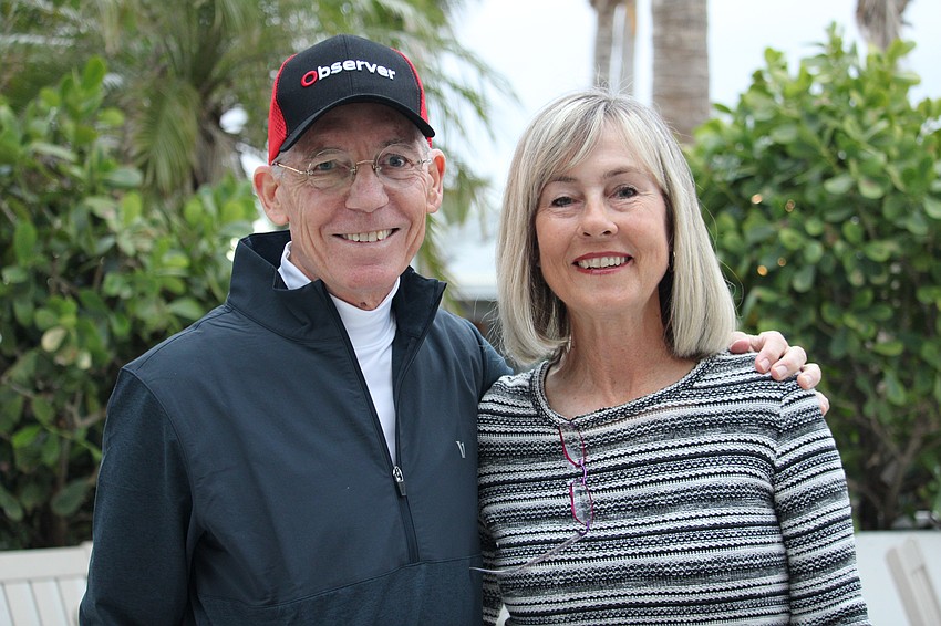 Matt Walsh and Kay Thayer smile ahead of this year's 25th annual Observer Challenge tennis tournament.