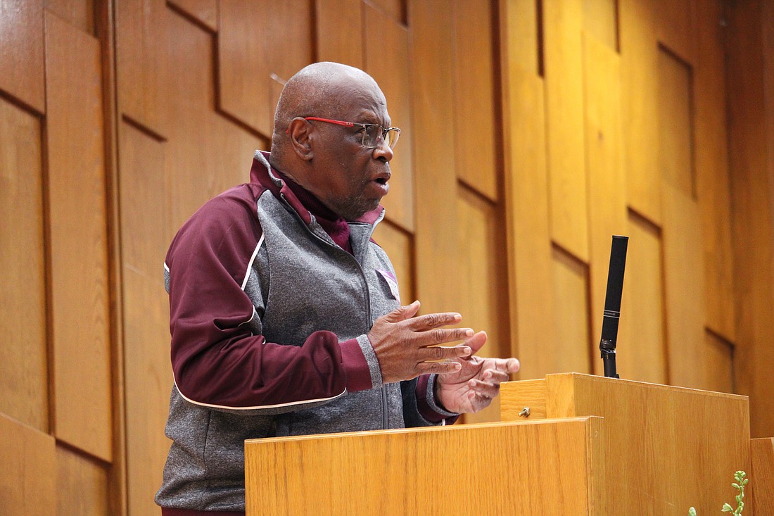 Guest speaker Walter Gilbert extolls the perseverance of Dr. Martin Luther King Jr. during the Friday Shabbat service at Temple Beth Israel.