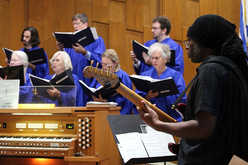 Bassist Johnnie Barker accompanies the choir at Friday's Shabbat service at Temple Beth Israel.