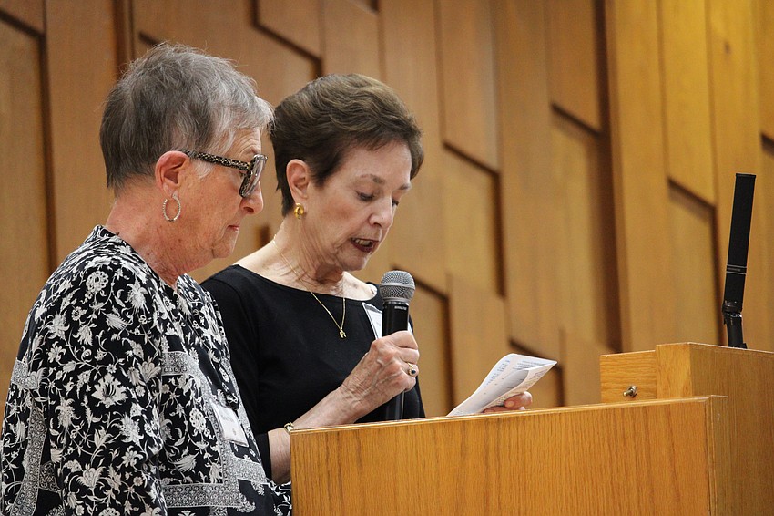 Gale Hacker and Nancy Milbauer offer a special reading at Friday's Shabbat service at Temple Beth Israel.