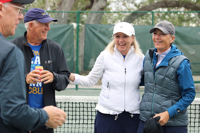 The division two winners celebrate winning dinner for four at Maison Blanche.