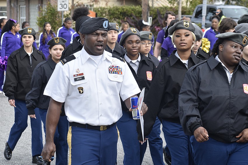 Chief Jason Greene leads the Booker High School JROTC squad.