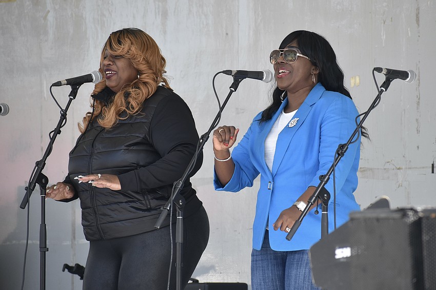 Kimla Murrell and Shmeeka Murrell-Clove perform with the gospel band Truality.