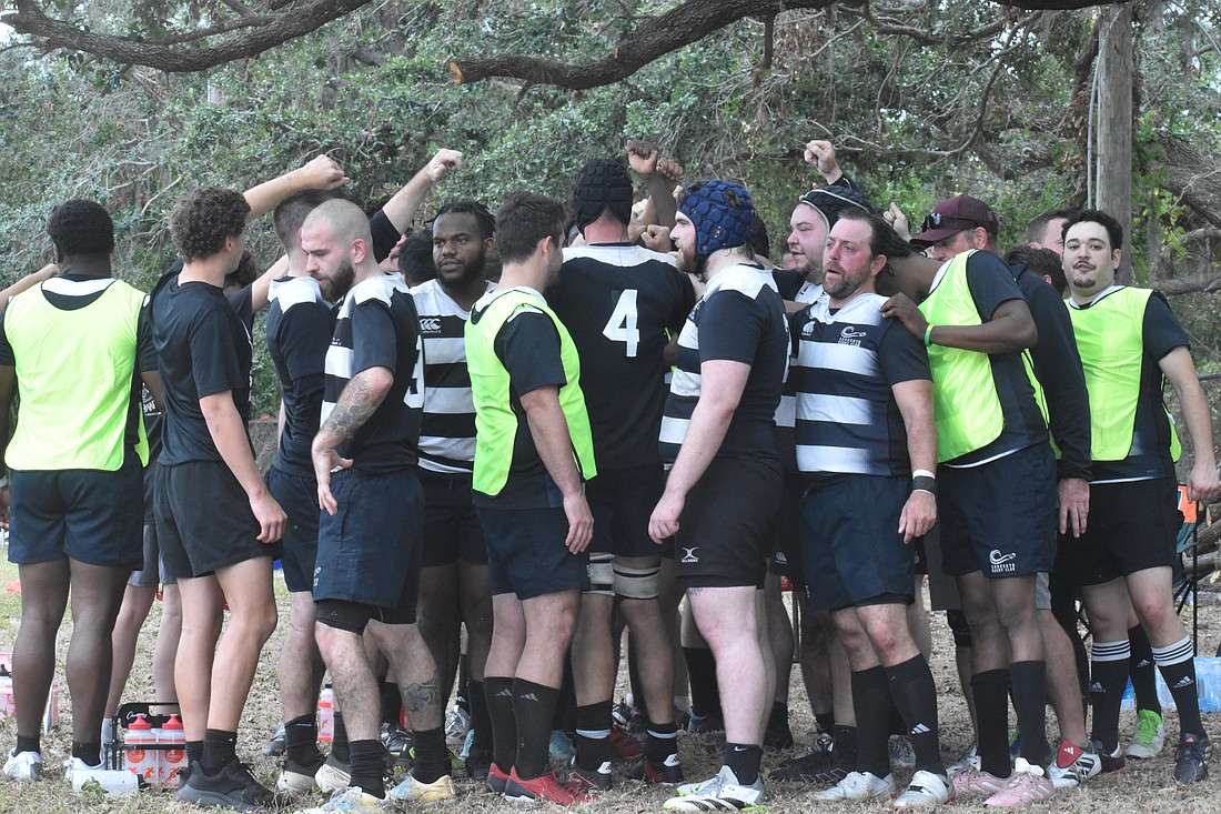 The Sarasota Surge Rugby Club gather together during halftime of its home match against the Lakeland Lancers on Jan. 18. Sarasota won 17-7.