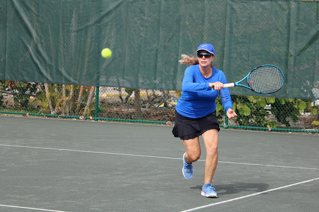 Irene Langlois races to the ball during her match.
