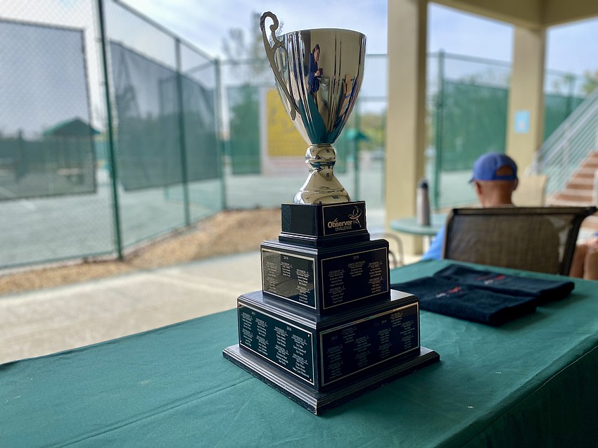 Tennis enthusiasts vie to have their names added to the Observer Challenge trophy.