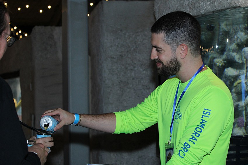 Anthony Lizardi with Islamorada Brewery and Distillery pours a brew.