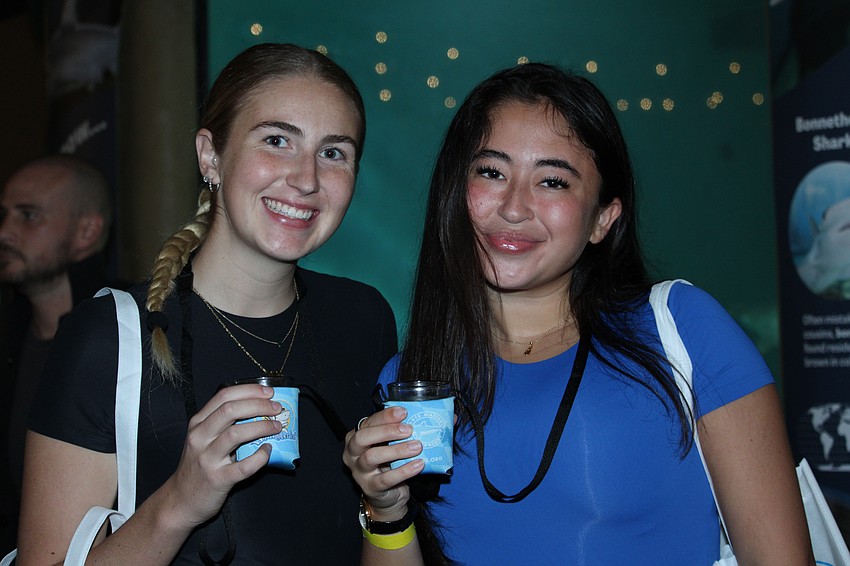 Shelly Lancaster and Kathryn Gentile cheers at Sharktoberfest.