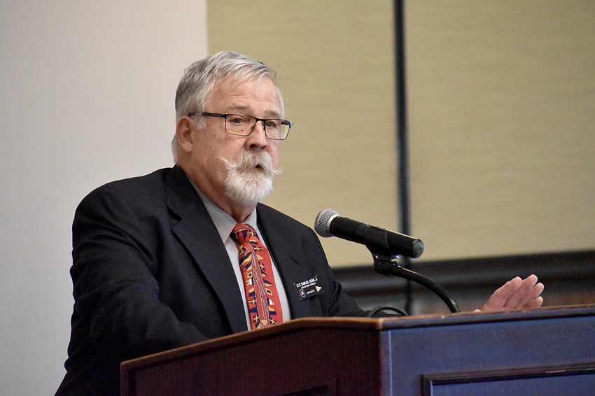 Sam Doak offers a speech.