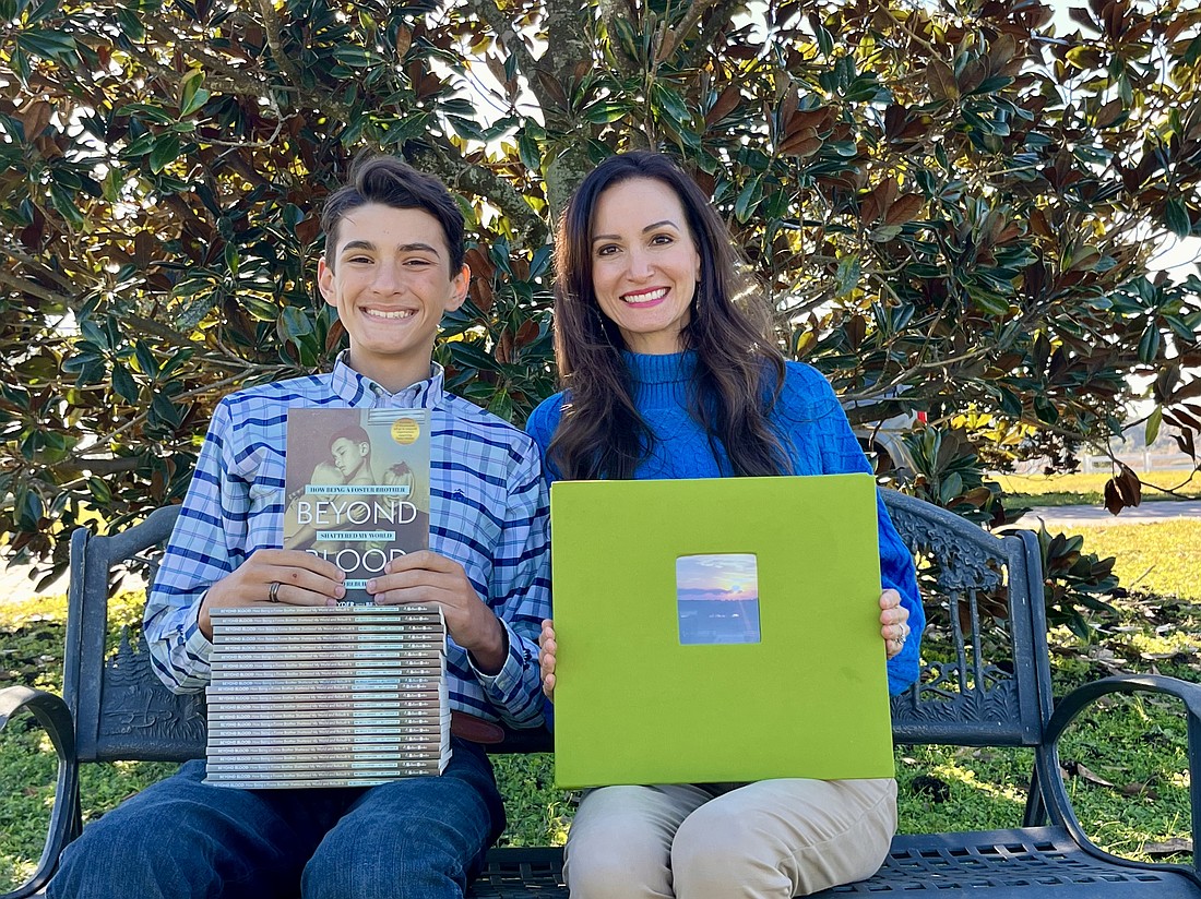 Michelle Snyder and her son, Ben Snyder Jr., have written about their experiences of opening their home to foster children. A large scrapbook carries photos of the more than 25 children who temporarily have been placed in their care.