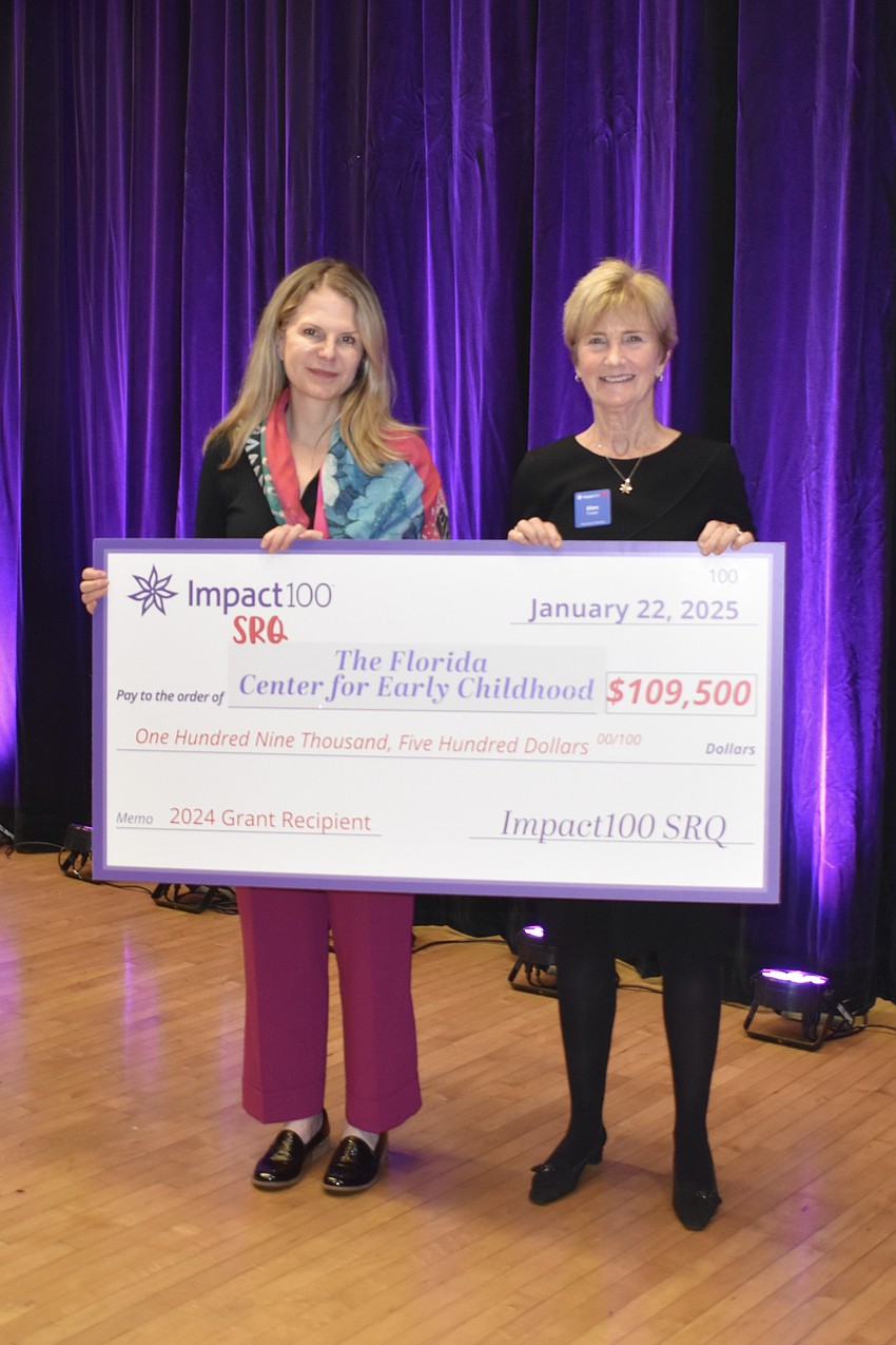 Kate Reed and Ellen Foster of The Florida Center for Early Childhood receive their grant.