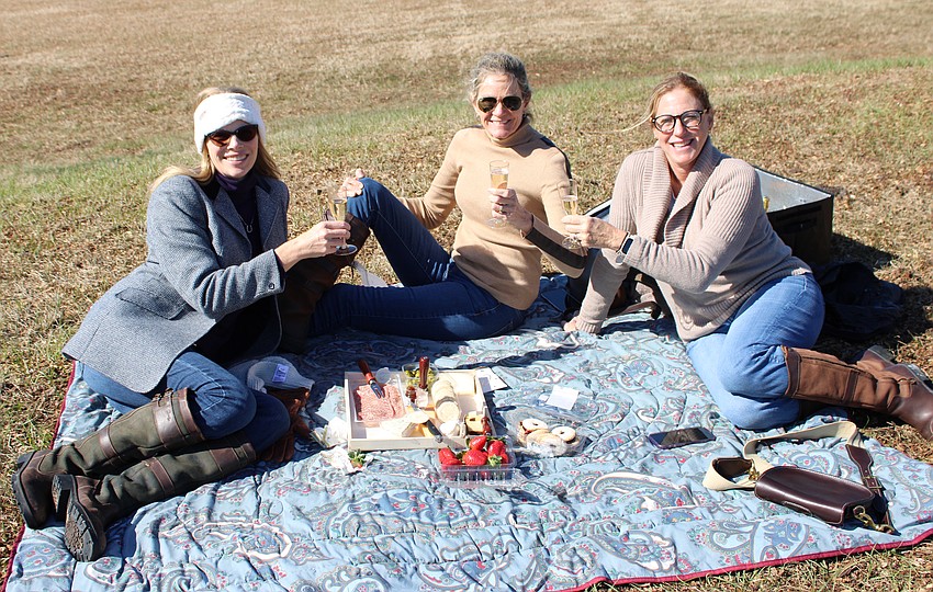 Sarasota's Amy Chenard, Wendy DeGilio and Katy Rosen enjoy champagne and a picnic lunch as they enjoy the Combined Driving at TerraNova Saturday.