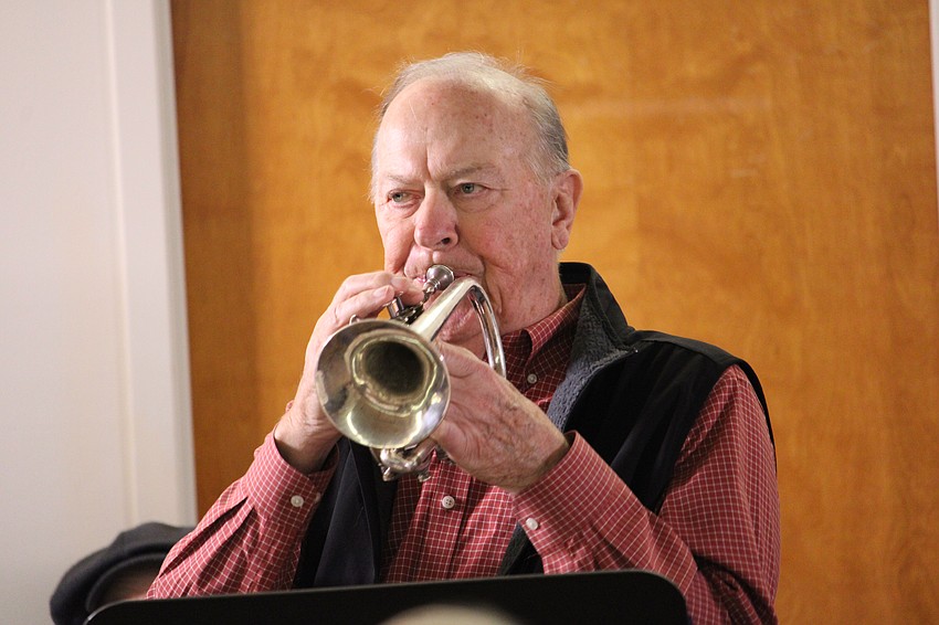 Lew Green solos with his cornet.