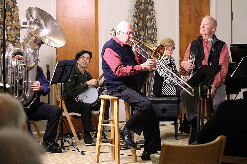 Kid Dutch and company entertain listeners at The Education Center.