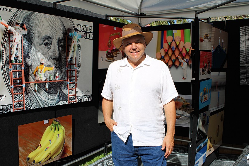 Photographer Eugene Lagana shows off his work.