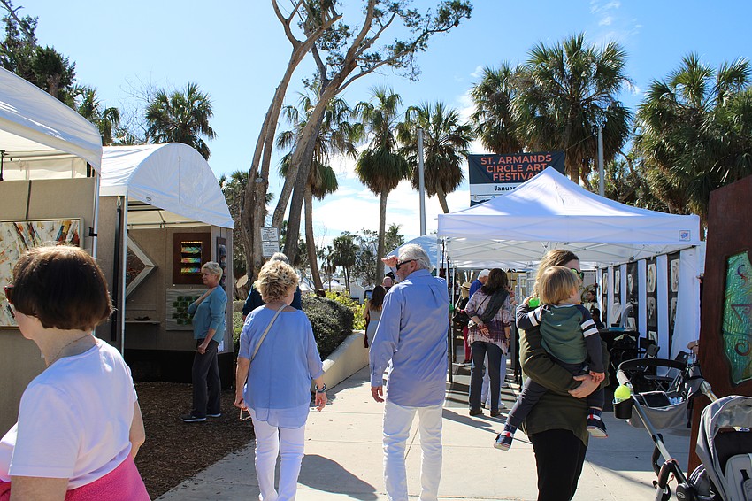 Visitors enter the St. Armands Circle Art Festival.