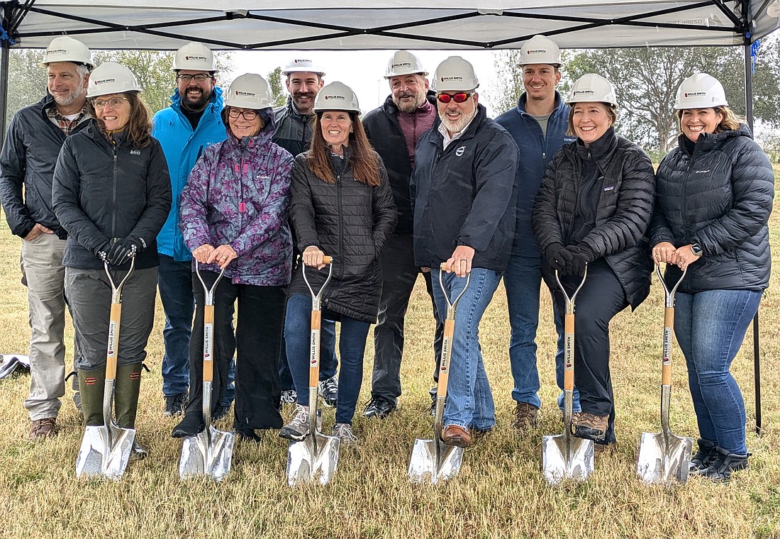 A cold and rainy day didn't deter participants of a ceremeonial groundbreaking of the Celery Fields Quad Parcels re-wilding project.