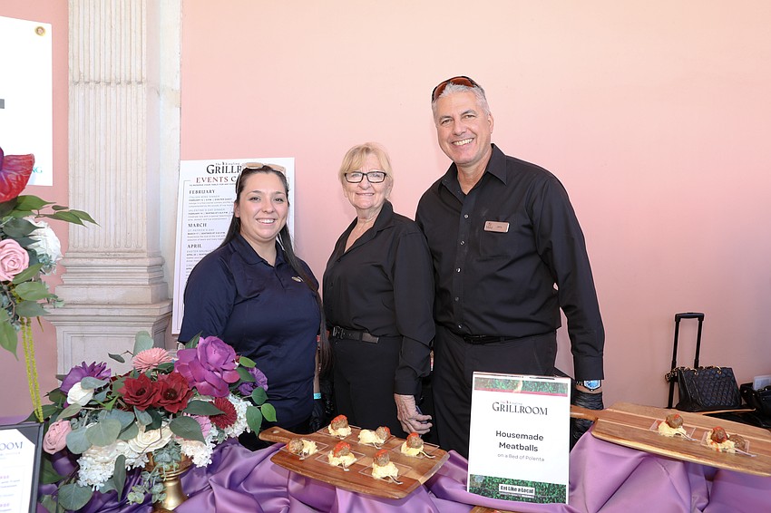 Genesys Blevins, Stephanie Gill and Jerry Martinez serve meatballs from the Ringling Grillroom.
