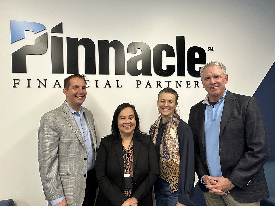 From left, Pinnacle Financial Partners Senior Vice Presidents Bryan Taylor and Lauren Huynh, Area Manager Debbie Buckland and Regional President Scott Keith.