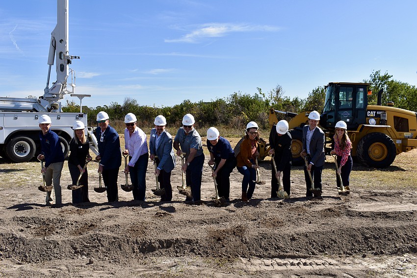 Manatee County commissioners and staff members celebrate the groundbreaking for the Athletics and Aquatics Center at Premier Sports Campus North.