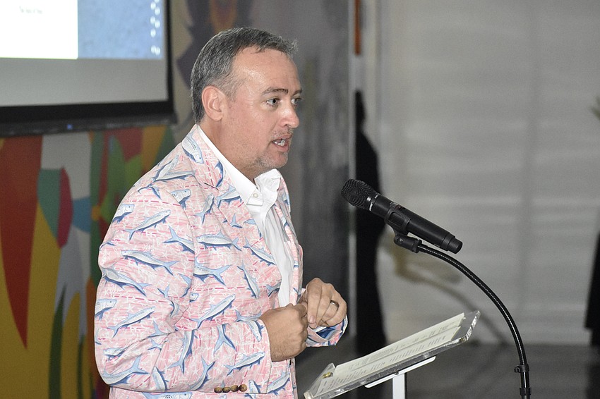 Eric Fleming, board chair of Siesta Key Chamber, offers a speech.