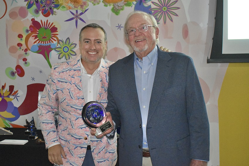 Board Chair Eric Fleming and Phil Trego, a volunteer of over 30 years