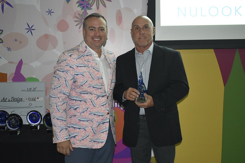 Randy Frey, president of Nu-Look Pressure Cleaning and Home Services Inc., was honored with the New Member Business Award for his dedication to the Chamber, his volunteering for community cleanups and help reopening Clayton's Siesta Grille after the hurricanes.