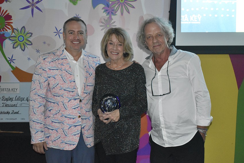 Kathy Elliott and husband Chris Elliott, owners of Signarama Sarasota were honored for using their artistic and marketing skills to create signage for Chamber events, and volunteering at the Crystal Classic.