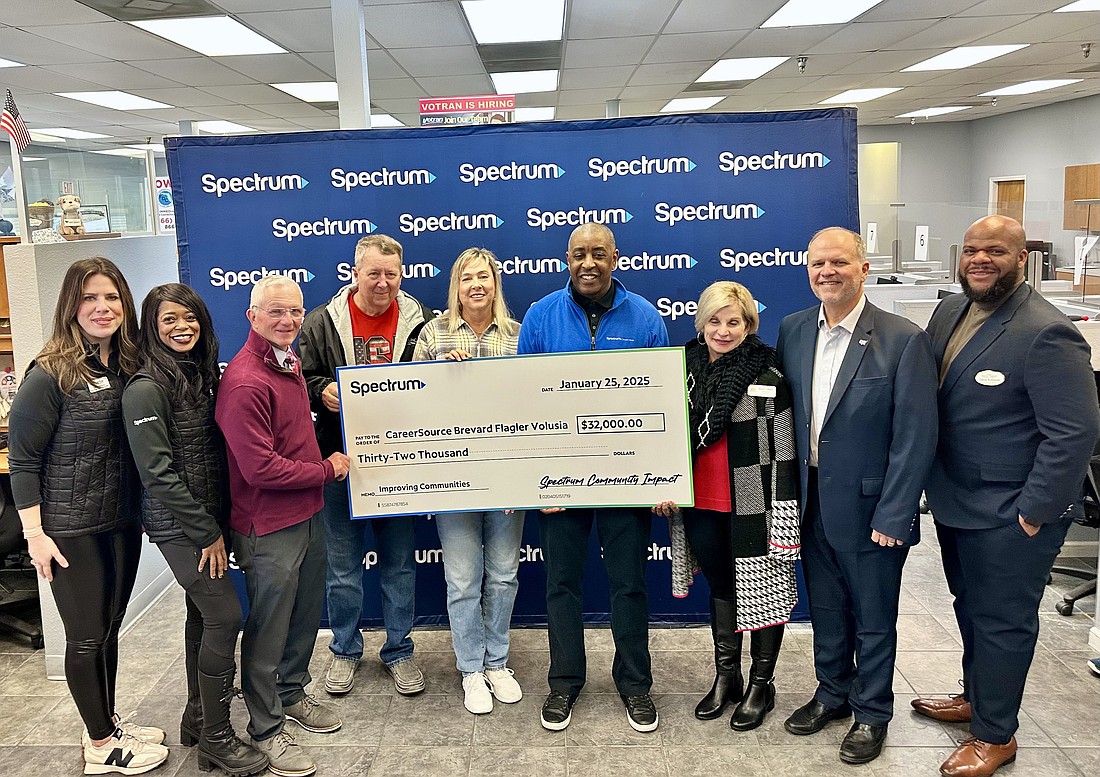 Spectrum presents a check for $32,000 to CareerSource Brevard Flagler Volusia. In the photo (left to right): Kate Wallace, State Government Affairs Director, Spectrum; Marva Johnson, Group Vice President, State Government Affairs, Spectrum; Jake Johansson, Council member at Large, Volusia County; Lloyd Gregg, Board Chair, CareerSource Brevard Flagler Volusia, PTX Engineering Services; Marci Murphy, Executive Director, CareerSource Brevard Flagler Volusia; Rahman Khan, Community Impact Group Vice President, Spectrum; Nancy Miller, Mayor of Daytona Beach Shores; Bill Partington, Florida House of Representatives, District 28; and David Robinson, Director of Advocacy, Daytona Regional Chamber of Commerce. Courtesy photo