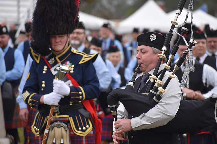 Butch Teston and Sean Buchta participate in the opening ceremony.